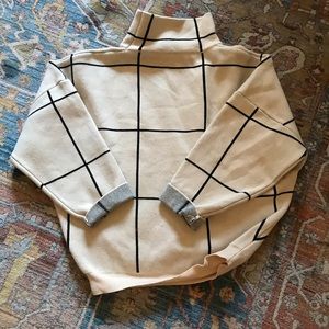 Grid turtleneck sweater